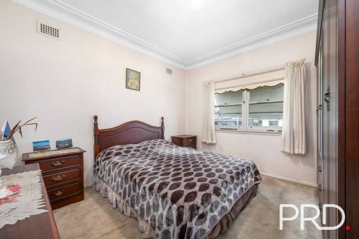 7 Coolaroo Cres, Lurnea NSW 2170, Australia
